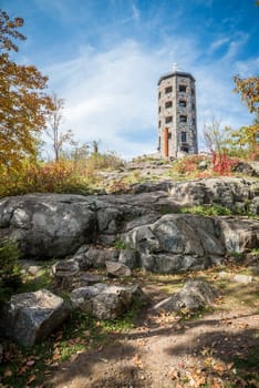 Stone tower in a public park during fall time