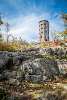 Stone tower in a public park during fall time