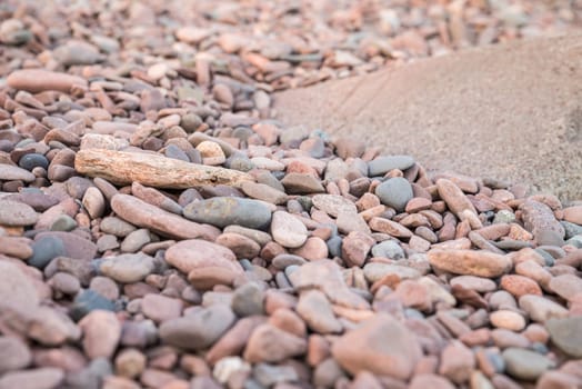 Different type of rocks on a lake shore
