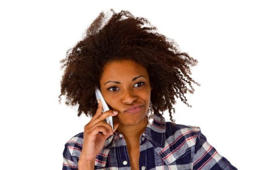 Young African-American woman with smartphone - exposed on a white background