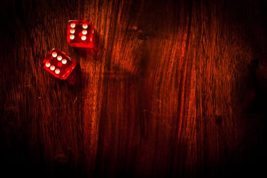 Two red dices showing a pair of sixes
