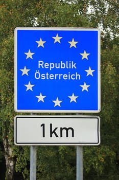 Traffic sign "Republic of Austria 1km"",Bavaria,Germany"