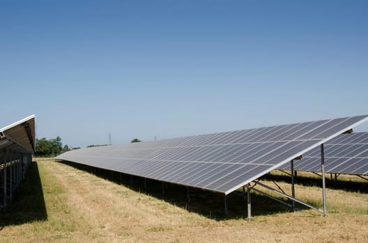solar panels in a solar field in Italy
