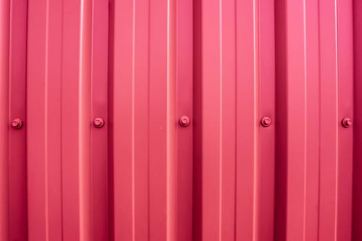 Colorful plastic wall with iron nuts