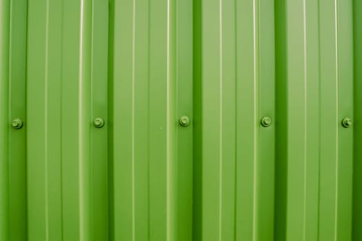 Colorful plastic wall with iron nuts