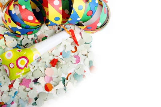 Streamers and confetti as party decoration for birthday with white background