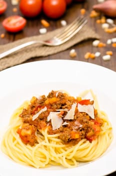 Spaghetti Bolognese with minced meat sauce in portrait format