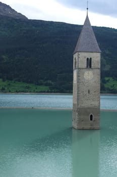 Church tower in the water at the Reschen Pass