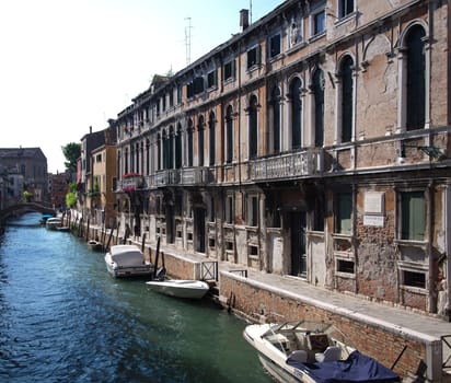 Canal in Venice with some boats