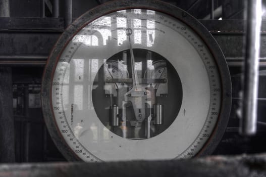 Big old industrial scale in an abandoned factory