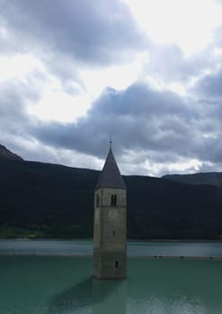 Church tower in the water at the Reschen Pass