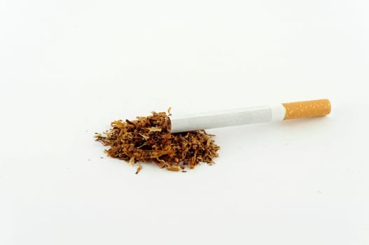 Cigarette and tobacco isolated on white