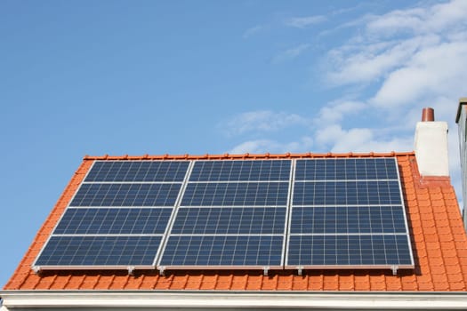 a solar system on the roof of a residential building