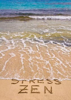 Words Stress anWords Stress and Zen written on sand, Stress word is washed away by waved Zen written on sand, Stress word is washed away by wave
