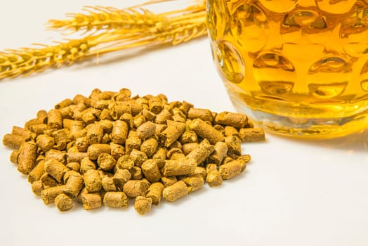 Hop pellets with beer glass