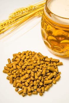 Hop pellets with beer glass