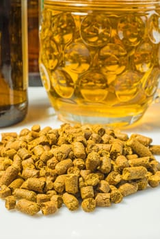 Hop pellets with beer glass