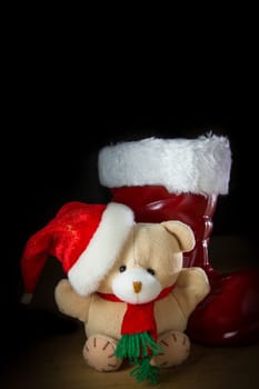 Cute toy christmas bear with santa hat