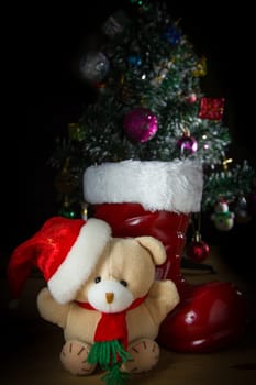 Cute toy christmas bear with santa hat