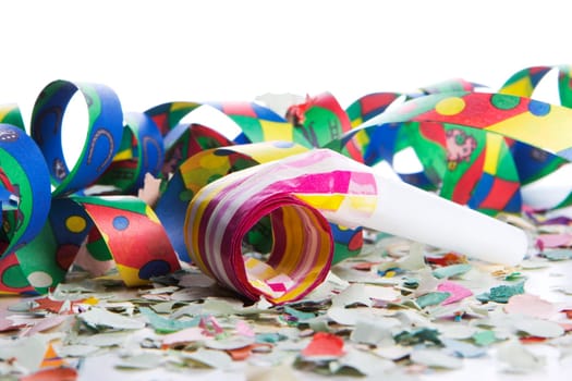 Streamers and confetti as party decoration for birthday with white background