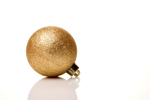 Christmas,golden Christmas bauble insulated with white background