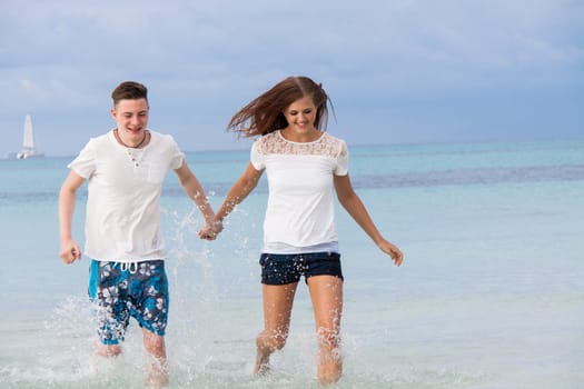 Newly in love young couple happy on the beach on holiday Summer leisure