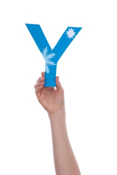 A Hand Holding the Blue and Snowy Letter Y, Isolated