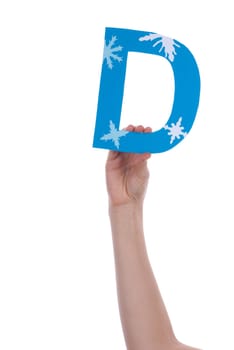 A Hand Holds a Snowy Blue D, Isolated