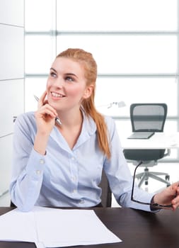 woman at desk think at new idea
