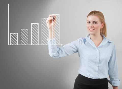 business woman hand drawing a graph, grey background
