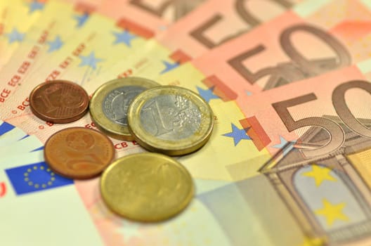 euro banknotes and coins