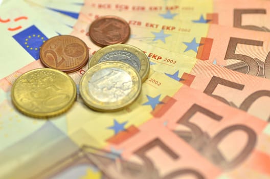 euro banknotes and coins