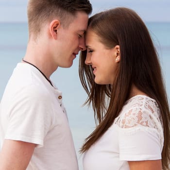 Newly in love young couple happy on the beach on holiday Summer leisure