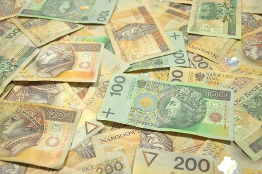 one and two hundred zloty banknotes from poland