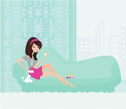 girl painting nails on the sofa