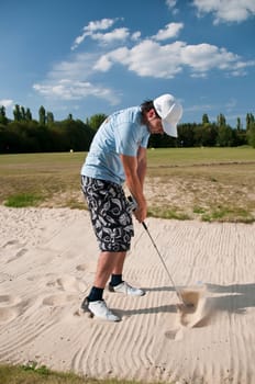 Young men play golf