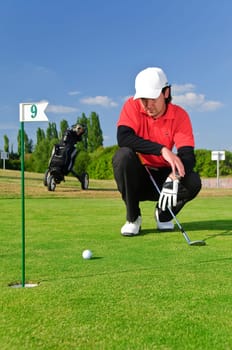 Young men play golf