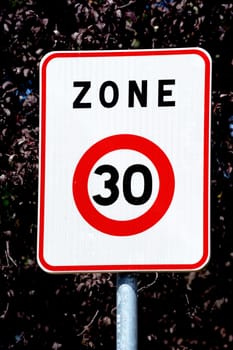 panel of speed limit at the entrance of a French village