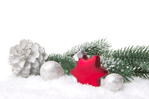 Christmas,decoration with fir branch,pine cone,Christmas bauble as a star red and white