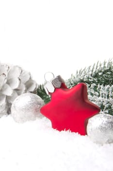 Christmas,decoration with fir branch,pine cone,Christmas bauble as a star red and white
