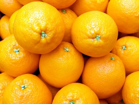 The beautiful oranges on a counter