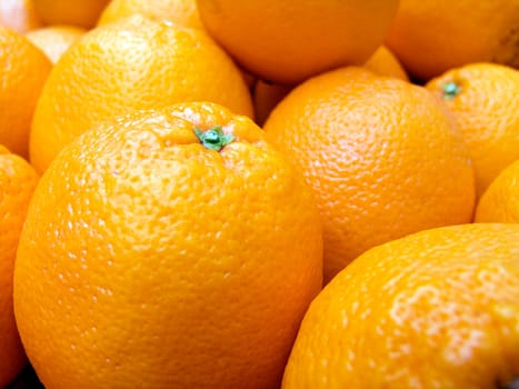 The beautiful oranges on a counter