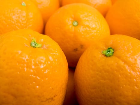 Agricultural background  a pile of beautiful oranges