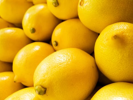 The beautiful yellow lemons on a counter