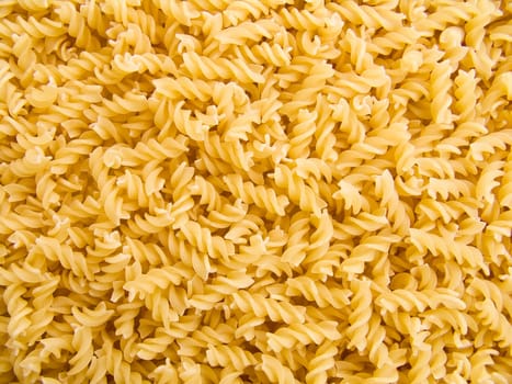 food background a pile of beautiful spiral pasta