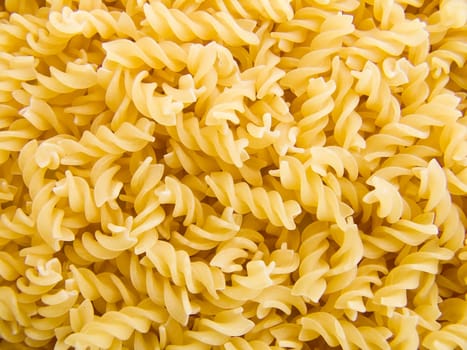 food background a pile of beautiful spiral pasta