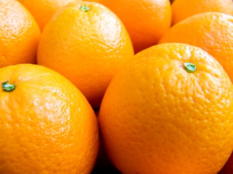 Agricultural background  a pile of beautiful oranges