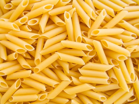 food background a pile of beautiful pasta tubules