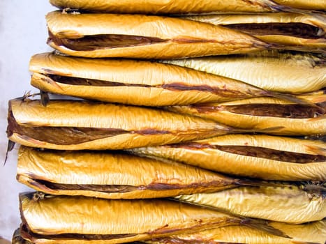 A pile of beautiful big mackerels on a counter
