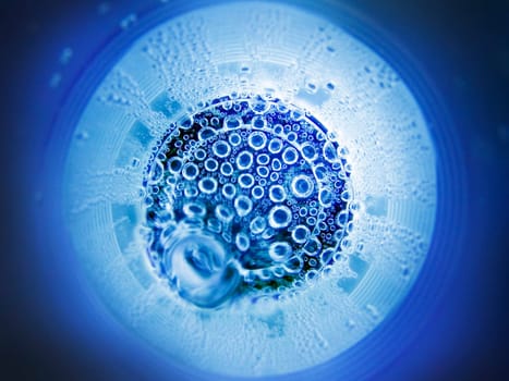 The abstract water oxygen bubbles blue background